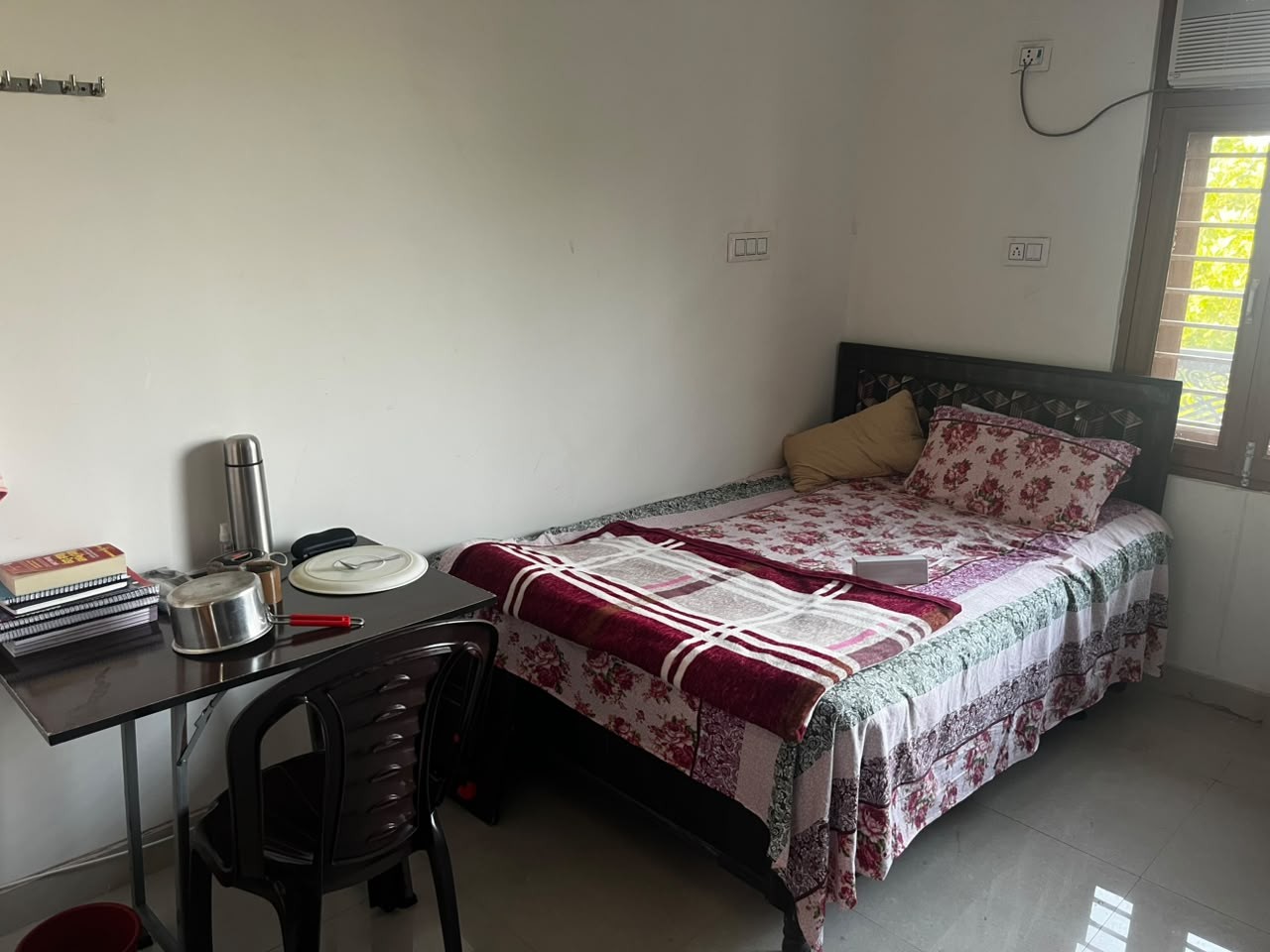 Well-lit room interior at Radhey Girls PG